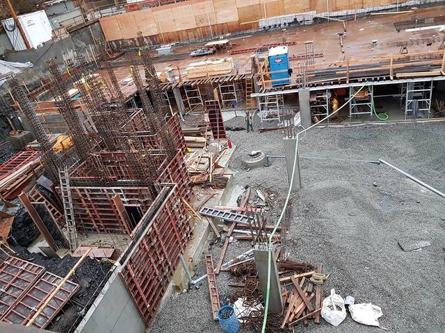 Basalt — two floors of underground parking with six levels of apartment units above grade.