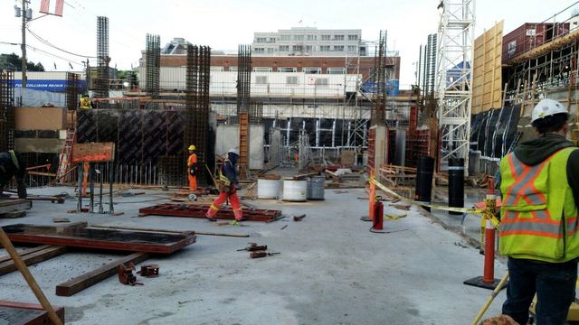 The Fifth — a commercial building of three levels of underground parking and five levels of office space.