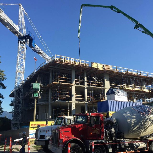 The Grayson — two floors of underground parking with six levels of apartment units above grade.