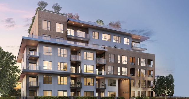 The Henry — two levels of underground parking with six levels of high-end apartment units above.